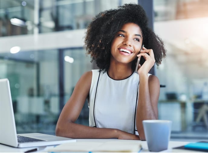 Woman calling AFC home warranty's 24-hour customer service center for home repairs